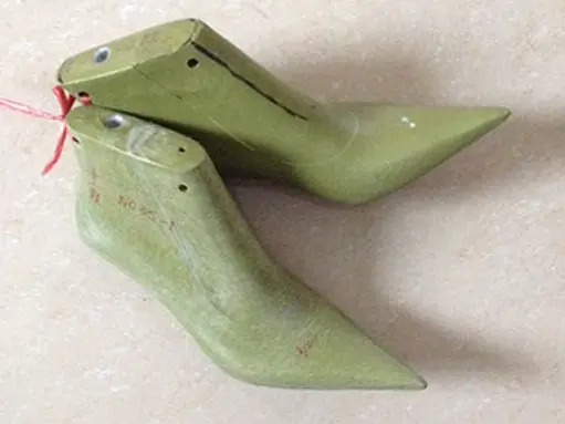 Green shoe lasts used for custom fitting