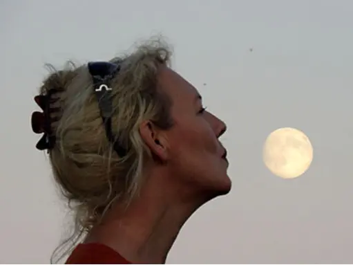 Ulla Hentze in profile beneath the moon